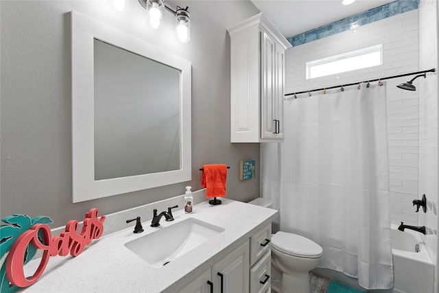 full bathroom with shower / bath combo, vanity, and toilet