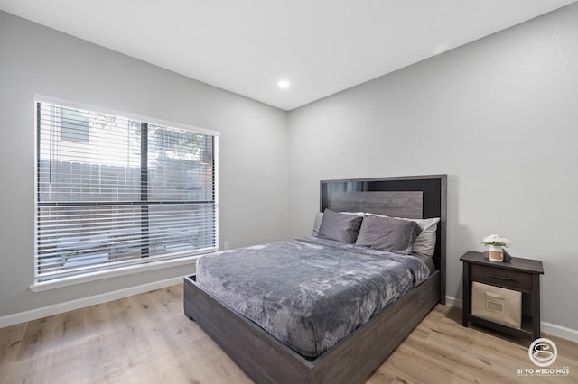 bedroom featuring light wood-type flooring