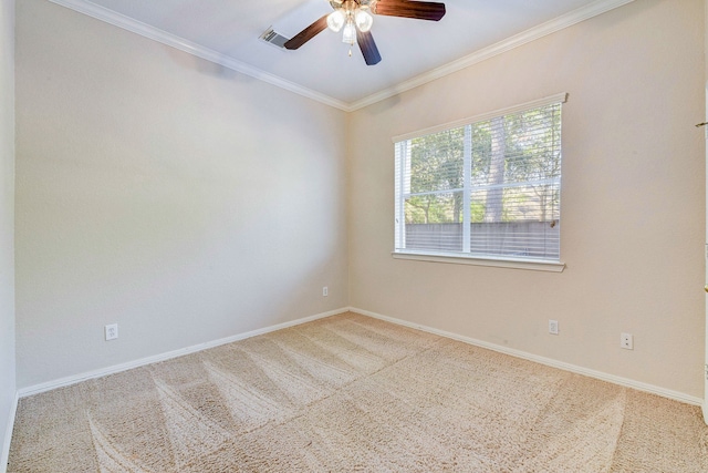 unfurnished room featuring ceiling fan, carpet flooring, and ornamental molding