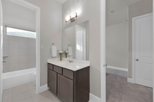 full bathroom with vanity, tile patterned floors, toilet, and shower / bath combination