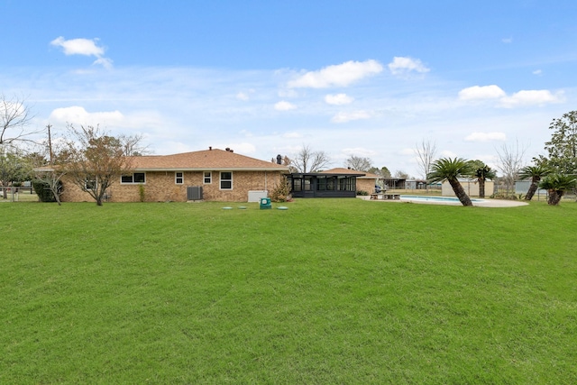 view of yard featuring central AC unit