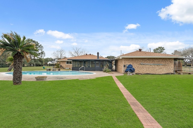 view of yard featuring a sunroom