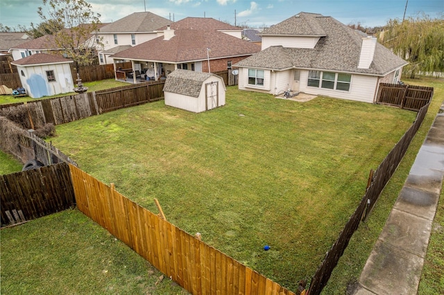 view of yard with a storage shed