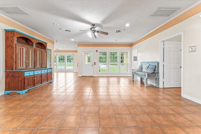 unfurnished living room with a textured ceiling, ceiling fan, ornamental molding, and light tile patterned flooring