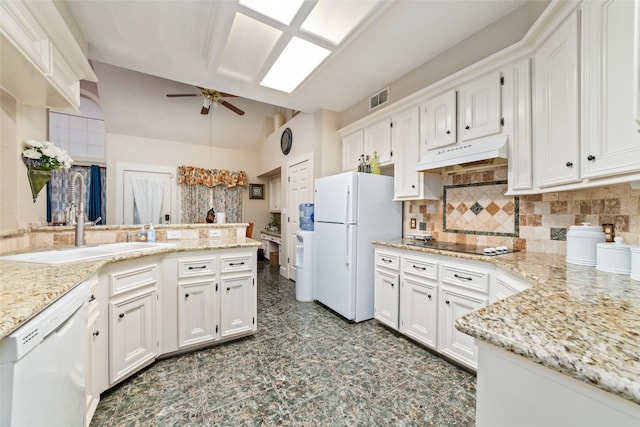 kitchen featuring ceiling fan, kitchen peninsula, white appliances, white cabinets, and custom range hood