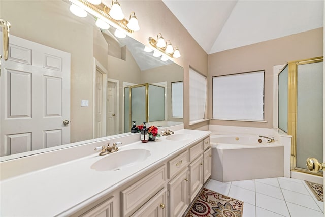 bathroom with plus walk in shower, vanity, tile patterned floors, and lofted ceiling