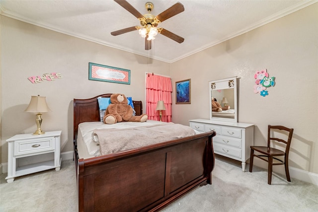 bedroom featuring light carpet, ceiling fan, and crown molding