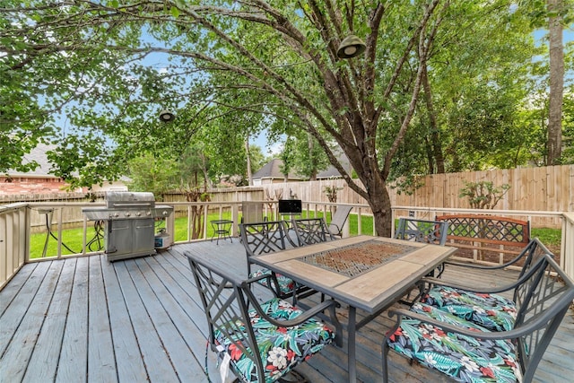 wooden terrace with grilling area