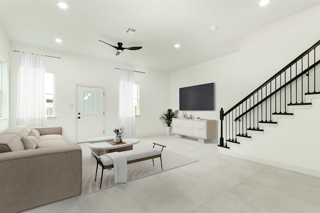 living room featuring ceiling fan