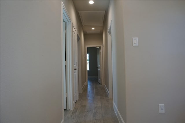 hall with light hardwood / wood-style flooring