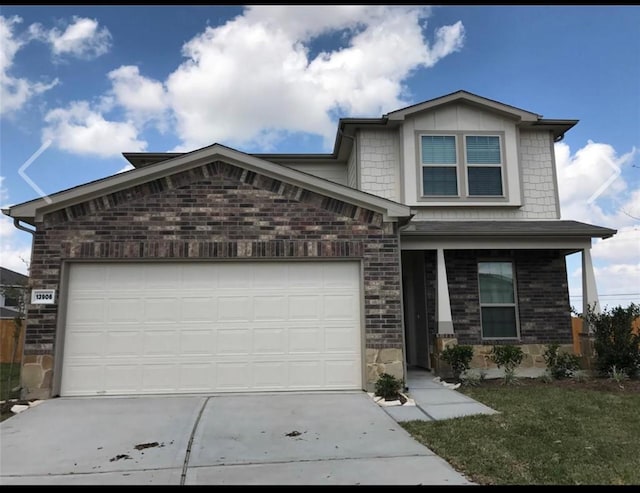 view of front of property featuring a garage