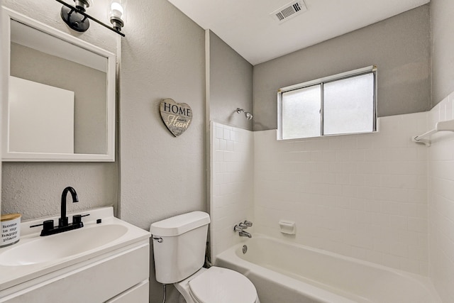 full bathroom featuring vanity, toilet, and shower / washtub combination