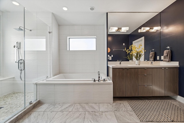 bathroom with shower with separate bathtub and vanity