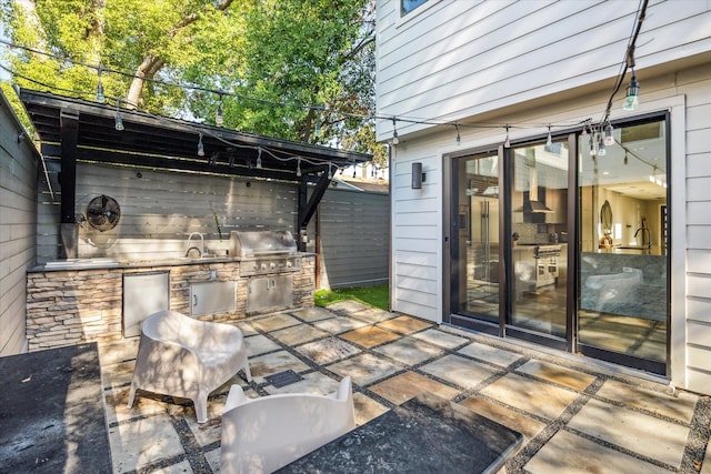 view of patio / terrace featuring sink, grilling area, and area for grilling