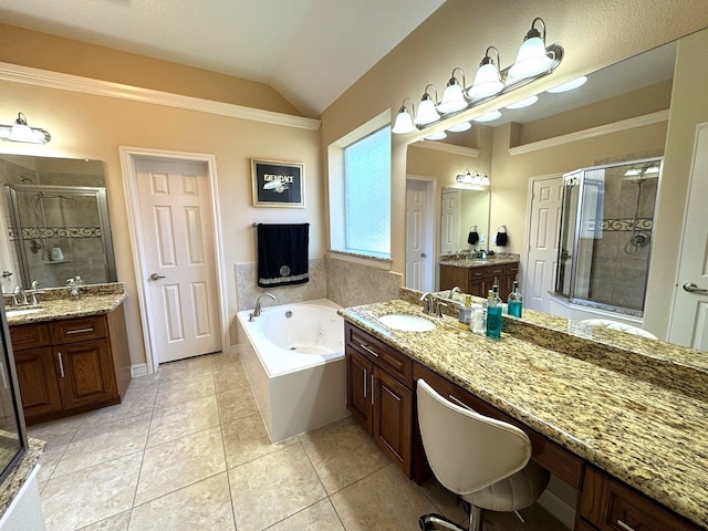 bathroom featuring tile patterned flooring, vanity, separate shower and tub, and lofted ceiling