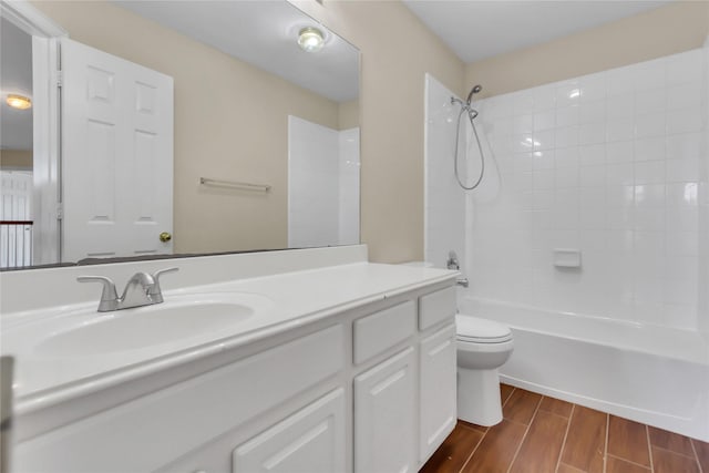 full bathroom featuring vanity, toilet, and tub / shower combination