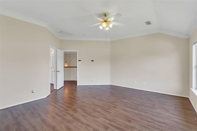 spare room with lofted ceiling, crown molding, ceiling fan, and dark hardwood / wood-style floors