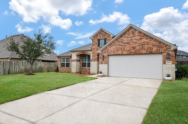 view of front of house featuring a front lawn and a garage