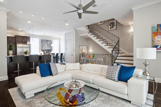 living room with ceiling fan, hardwood / wood-style floors, and ornamental molding