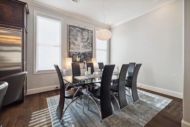 dining room with dark wood-type flooring and ornamental molding