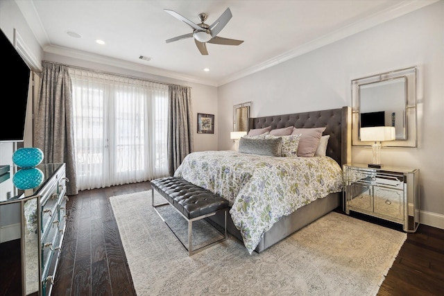 bedroom featuring dark wood-type flooring, ceiling fan, and crown molding