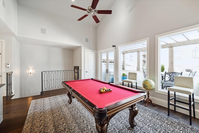 game room featuring dark wood-type flooring, high vaulted ceiling, ceiling fan, and billiards