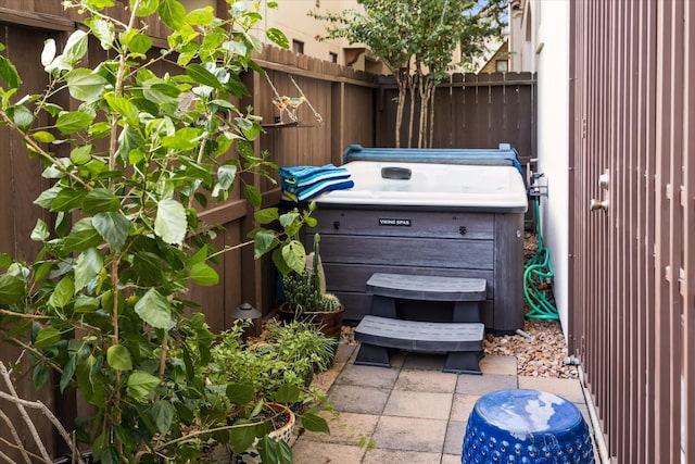 view of patio featuring a hot tub