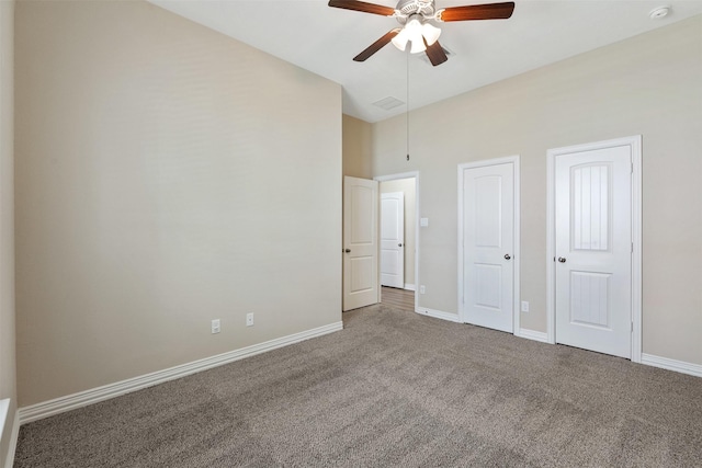 unfurnished bedroom with carpet and ceiling fan