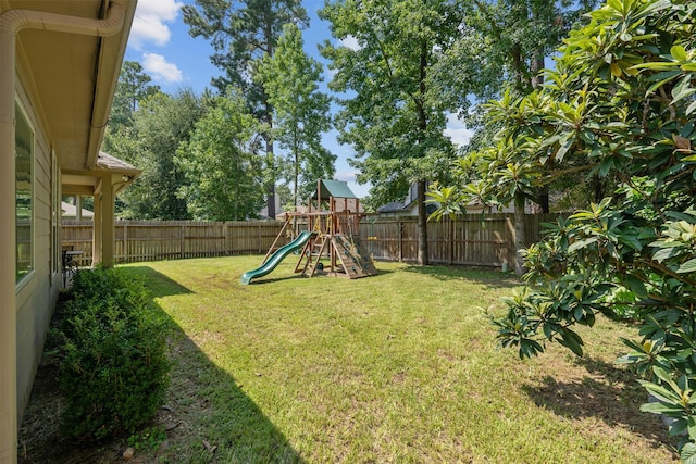 view of yard with a playground