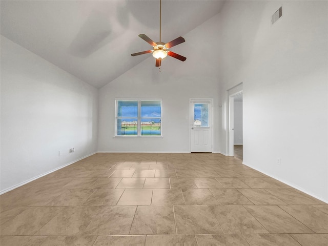 unfurnished living room featuring ceiling fan, high vaulted ceiling, and light tile patterned floors