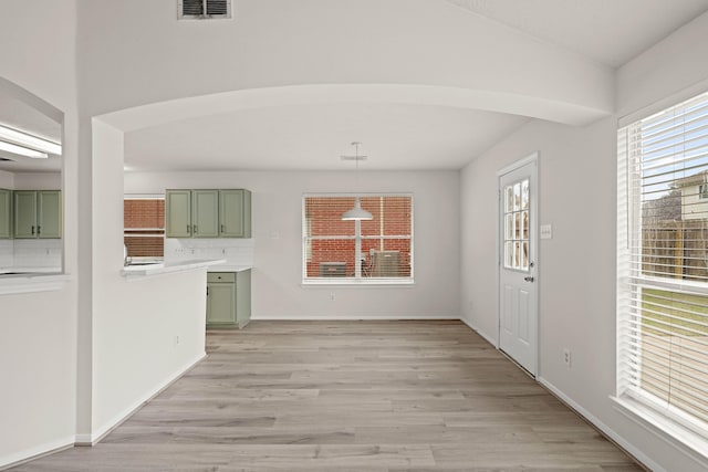 unfurnished living room featuring light hardwood / wood-style flooring