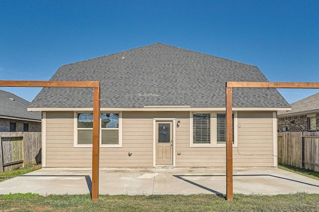 back of property featuring a patio area