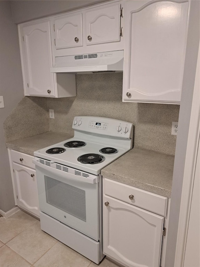 kitchen featuring extractor fan, white cabinetry, and white range with electric stovetop