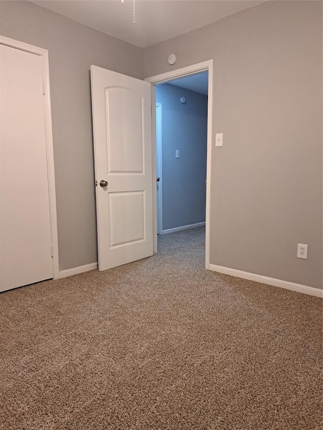 spare room with carpet flooring