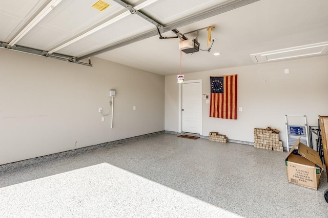 garage featuring a garage door opener