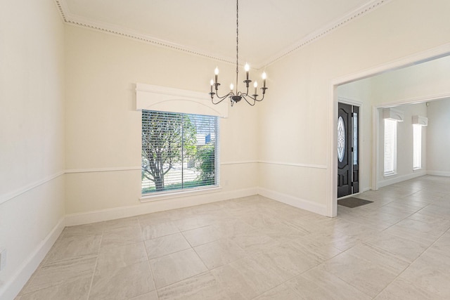 spare room featuring light tile patterned floors and an inviting chandelier