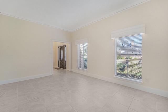 empty room featuring light tile patterned floors