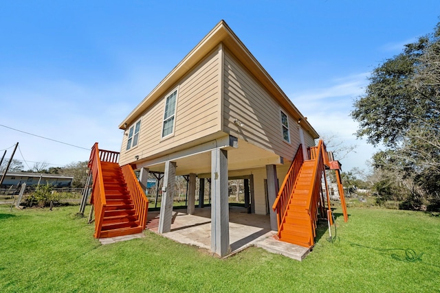 view of jungle gym featuring a lawn and a patio