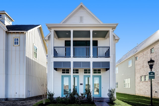 view of front of house with a balcony