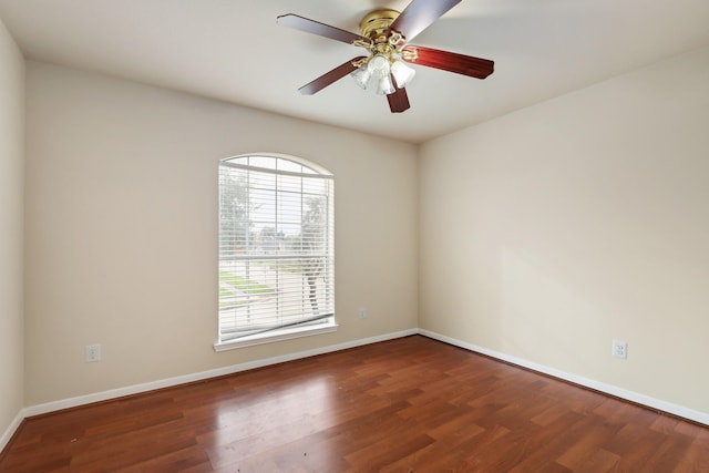 spare room featuring ceiling fan and hardwood / wood-style flooring