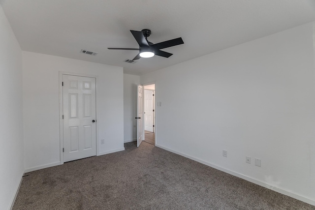 unfurnished bedroom featuring carpet floors and ceiling fan