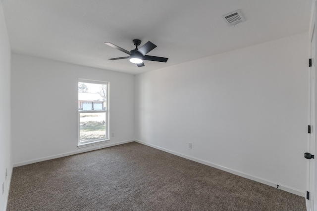 unfurnished room featuring ceiling fan and carpet floors