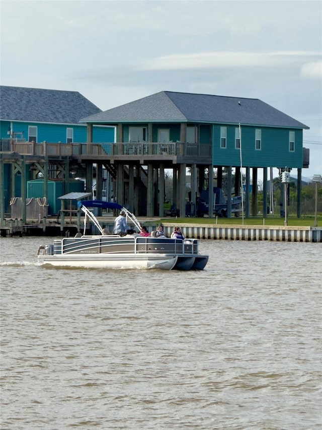 view of home's community with a water view