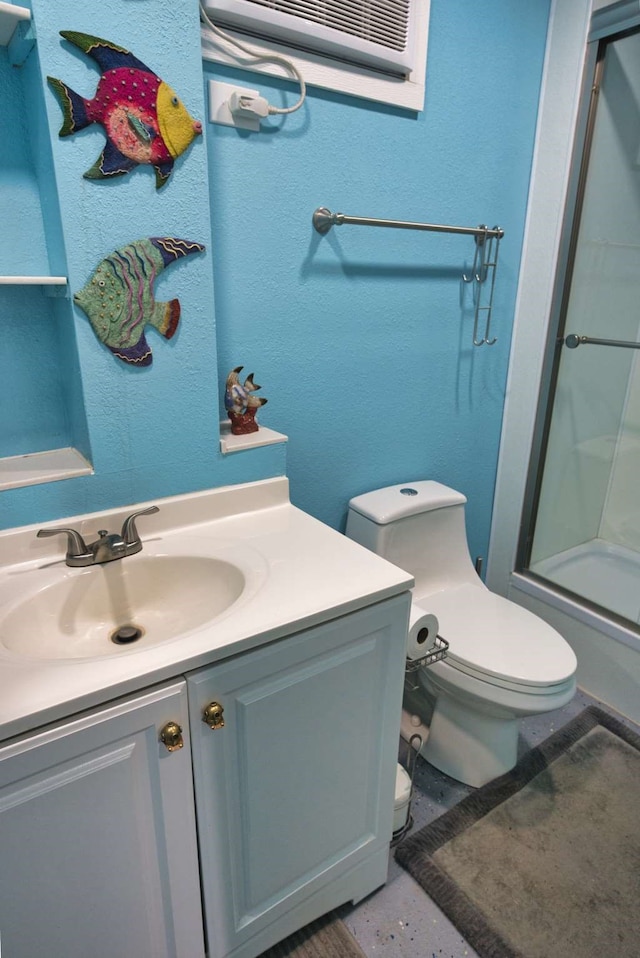 full bathroom featuring vanity, toilet, and bath / shower combo with glass door