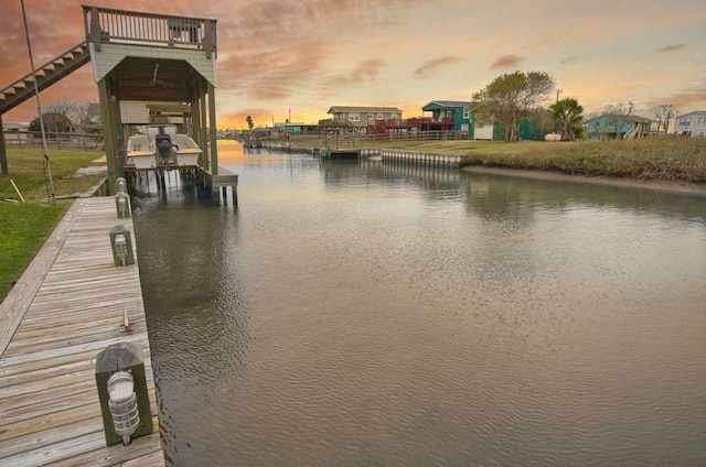 view of dock with a water view