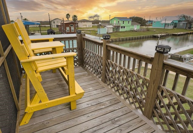 deck at dusk with a water view