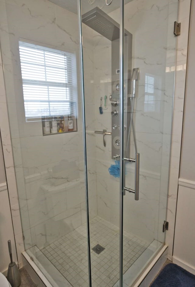 bathroom featuring walk in shower