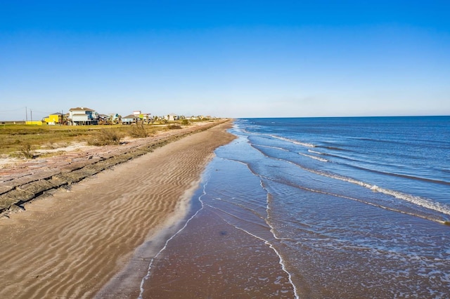 property view of water featuring a view of the beach