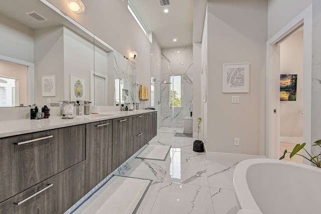 bathroom with shower with separate bathtub and vanity