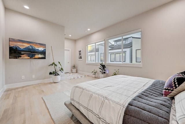 bedroom featuring light wood-type flooring